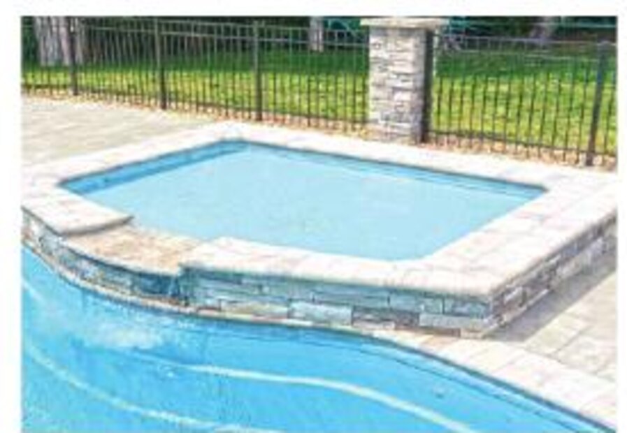 The curved TL-C tanning ledge by Aviva Pools